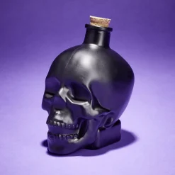 Bouteille poison décoration Halloween crâne en verre noir 10x8,5xH14cm