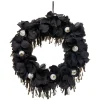 Couronne de fleurs noires lumineuse pour porte
