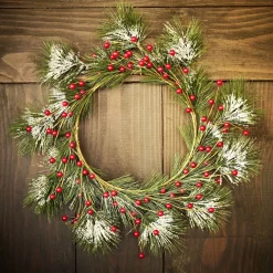 Couronne de Noël ronde branche sapin vert et baies rouges