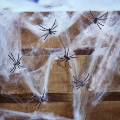 Décoration Halloween toile blanche avec 6 araignées