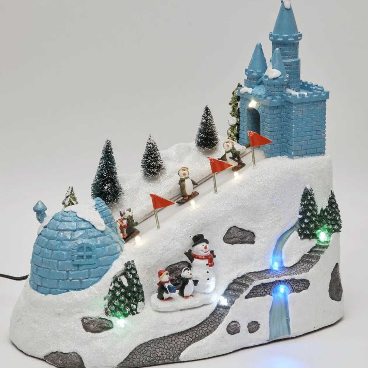 Piste de glisse pingouin animé village crèche Noël