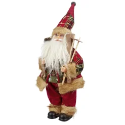 Père Noël à poser avec ski bâton et hotte rouge et blanc