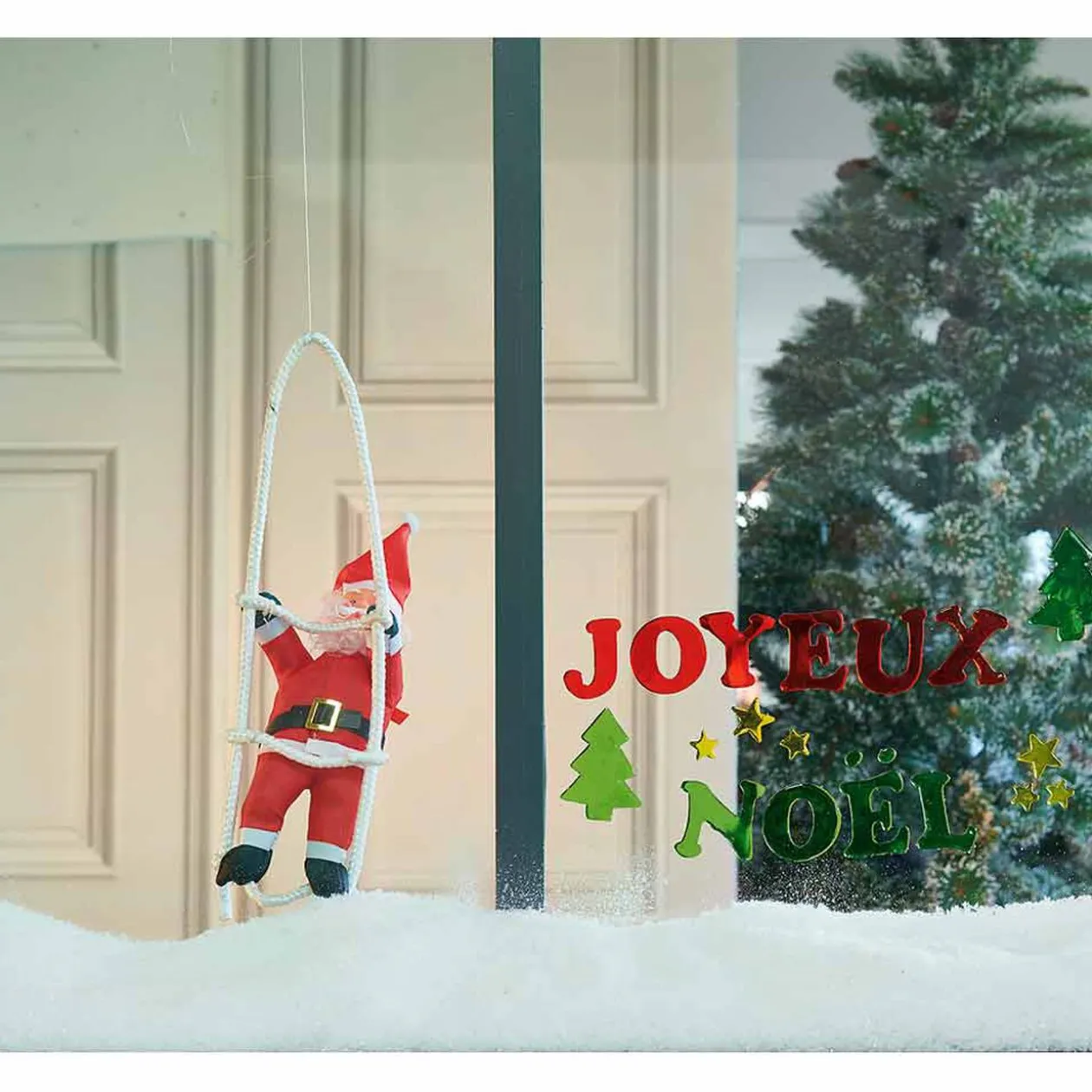 Père Noël grimpeur sur échelle h. 20 cm