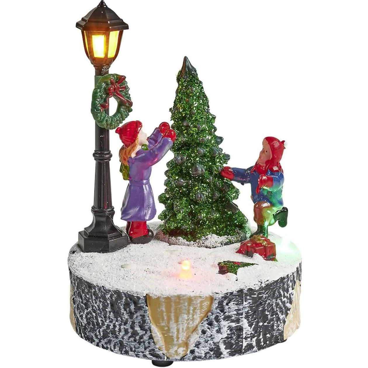 Scène village de Noël avec lanterne lumineuse