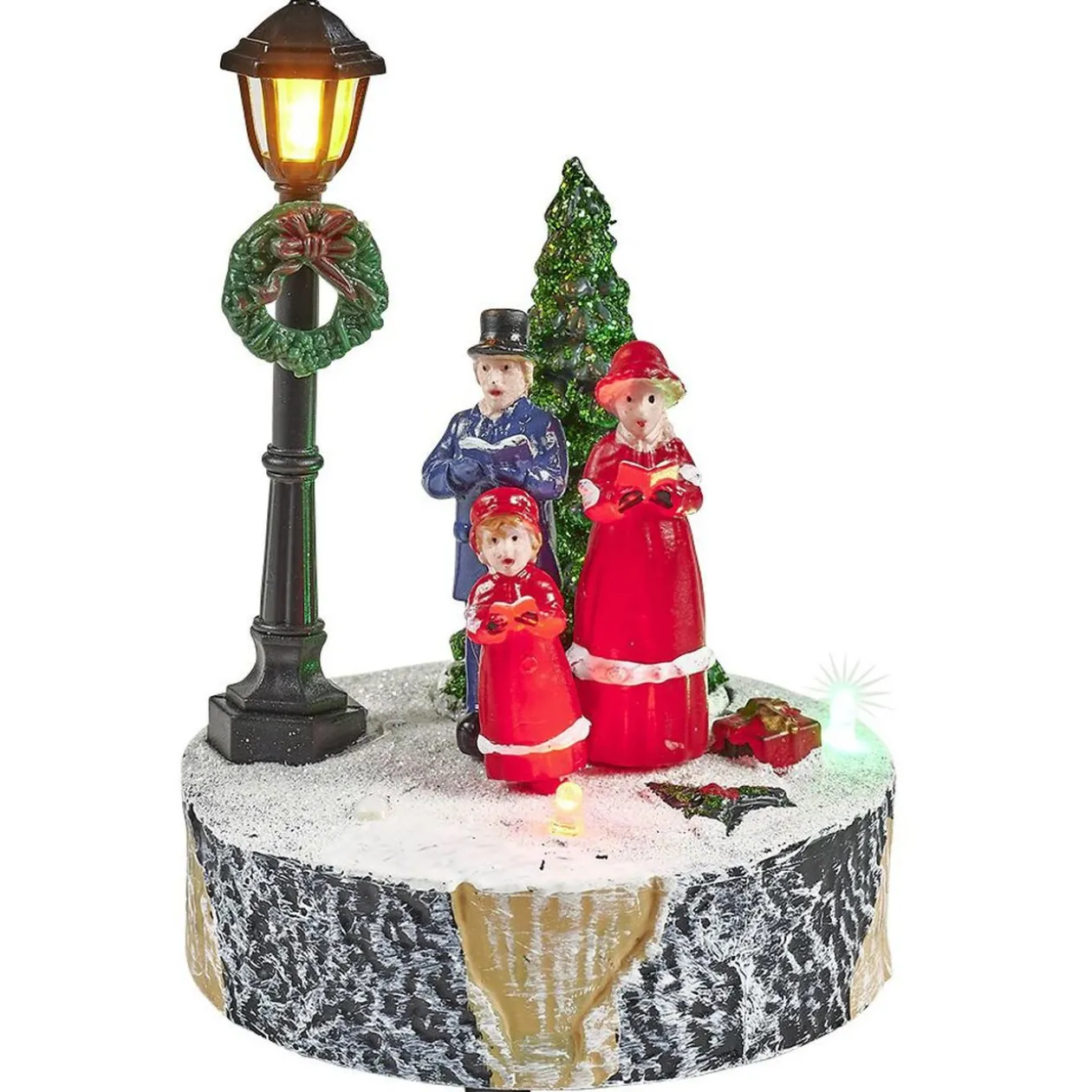 Scène village de Noël avec lanterne lumineuse