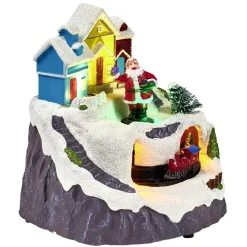 Scène village de Noël lumineuse avec train animé