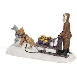 Sujet de Noël personnage sur traineau avec chien en résine