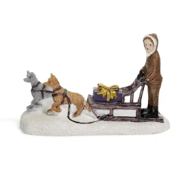 Sujet de Noël personnage sur traineau avec chien en résine
