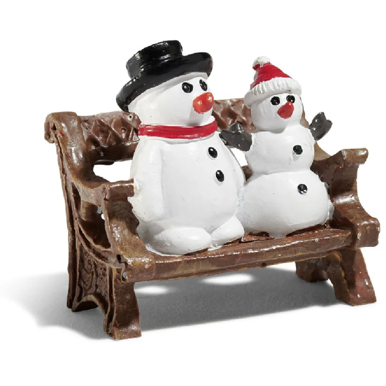 Sujet village de Noël bonhomme de neige sur banc